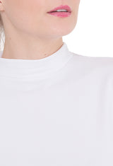 Camiseta térmica afelpada cuello alto.