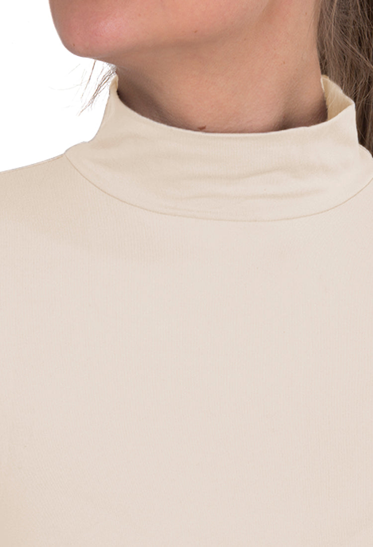 Camiseta térmica afelpada cuello alto.